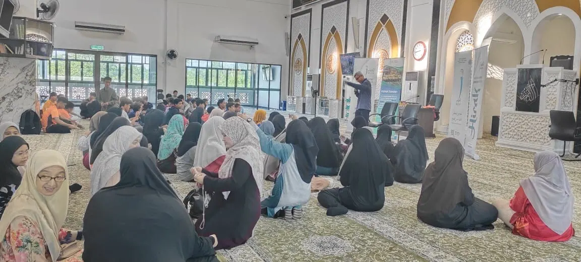 Community audience during a past facilitation session at Masjid Imam Syafie