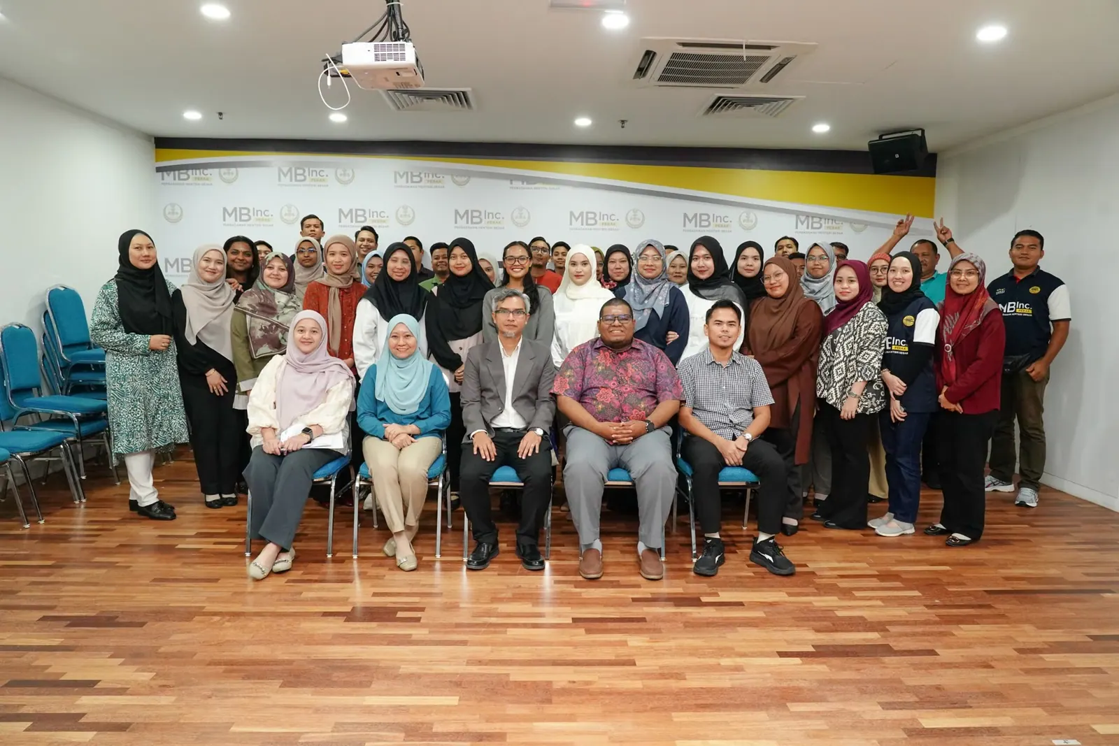 Group photograph following a past facilitation engagement at MBInc